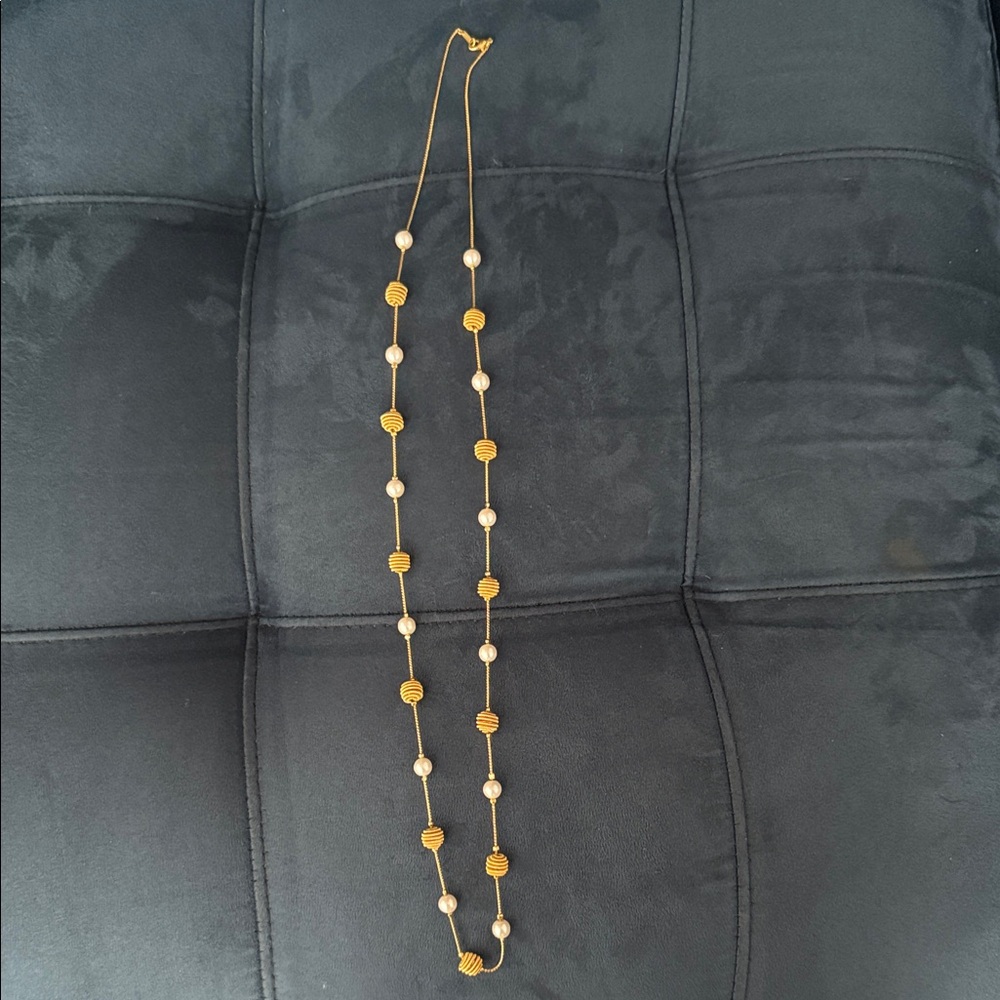 Elegant Gold and White Beaded Necklace